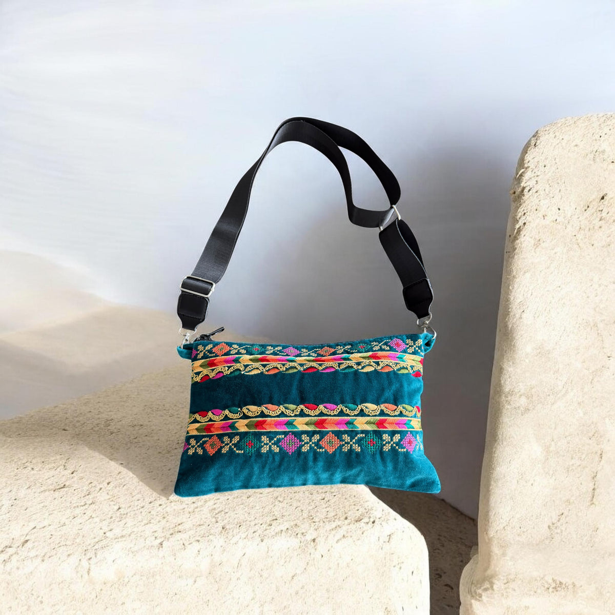 Alwan AlTurath Crossbody in green velvet, with colorful embroidered tatreez and a black adjustable strap